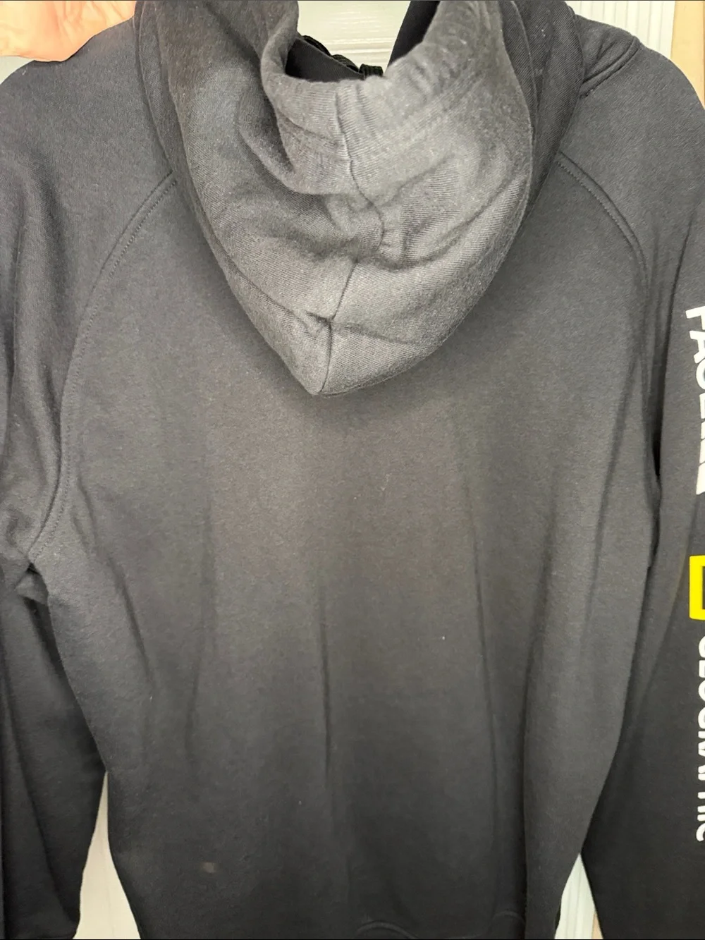 The North Face Black Hoodie with Yellow Map Accent